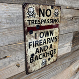 No Trespassing – I Own Firearms and a Backhoe Metal Sign