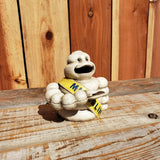 Michelin Man Cast Iron Mechanical Coin Bank