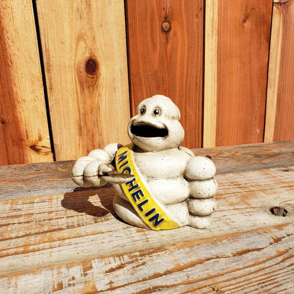 Michelin Man Cast Iron Mechanical Coin Bank