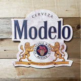 Modelo Seal Embossed and Shaped Metal Sign