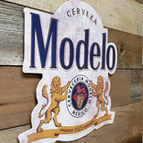 Modelo Seal Embossed and Shaped Metal Sign